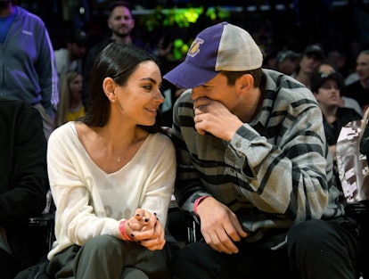 LOS ANGELES, CA - NOVEMBER 13: Mila Kunis and Ashton Kutcher attend a basketball between the Los Ang...