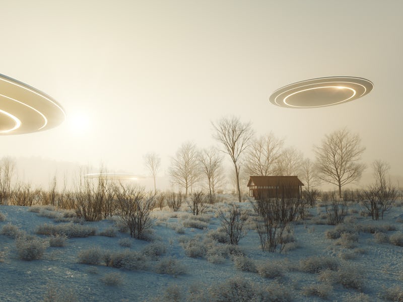 UFOs flying over winter landscape. 3D generated image.