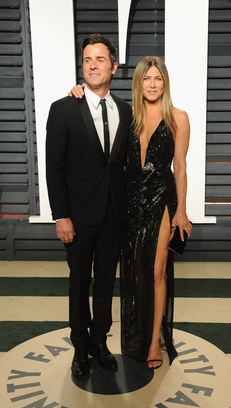 Justin Theroux (L) and Jennifer Aniston attend the 2017 Vanity Fair Oscar Party 