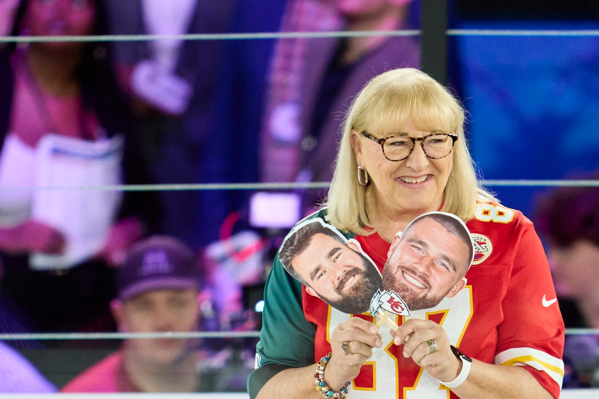 PHOENIX, AZ - FEBRUARY 06: Donna Kelce holds up photos of her sons, Jason Kelce #62 of the Philadelp...