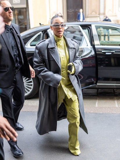 Kim Kardashian wears a Prada look at the brand's Milan Fashion Week Fall/Winter 2022/2023 show. 