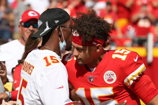 Kansas City Chiefs quarterback Patrick Mahomes (15) hugs his dad before an AFC West matchup between ...