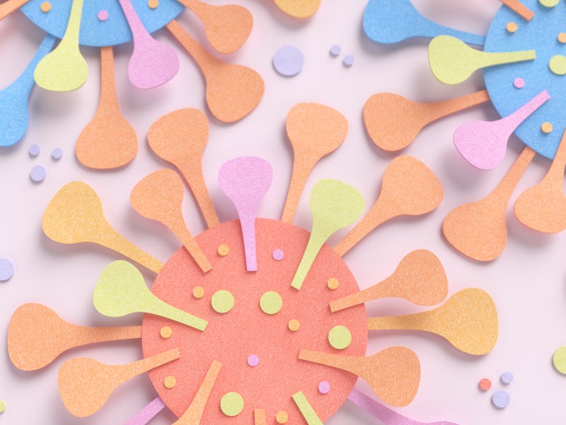 Colored paper coronavirus cut from cardboard on a pink background. 3d illustration.