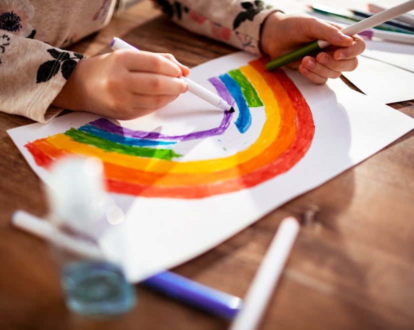 Close up of a little girl drawing and painting at home, st. patrick's day coloring pages for prescho...