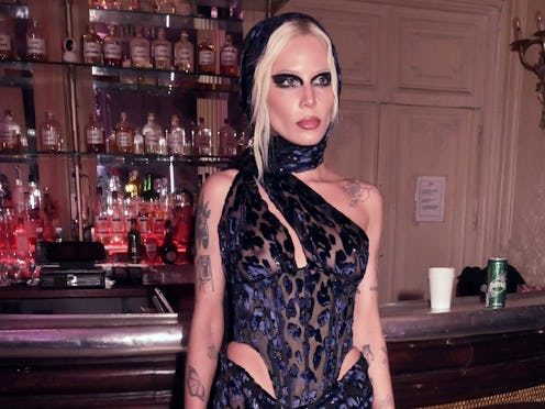 Halsey attends the Pressiat Womenswear Fall Winter 2023-2024 show in a sheer leopard bustier and sk...