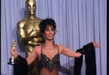 049944 35: Actress Cher holds her Best Actress in a Leading Role Oscar for "Moonstruck" at the Acade...