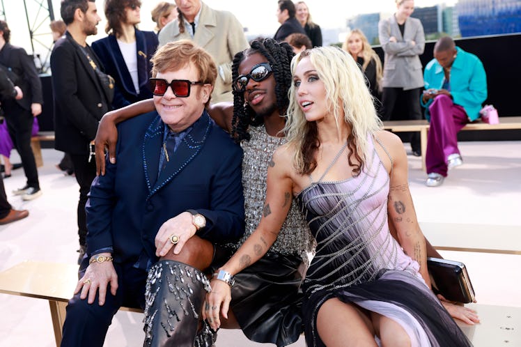 Elton John, Lil Nas X, and Miley Cyrus attend the Versace FW23 Show