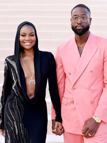 Gabrielle Union and Dwyane Wade attend the Versace FW23 Show 