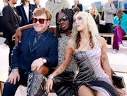 WEST HOLLYWOOD, CALIFORNIA - MARCH 09: (L-R) Elton John, Lil Nas X, and Miley Cyrus attend the Versa...