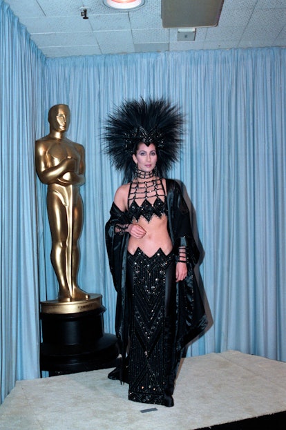 (Original Caption) 3/24/1986-Los Angeles, CA-Cher is shown in a full-length photo from backstage at ...