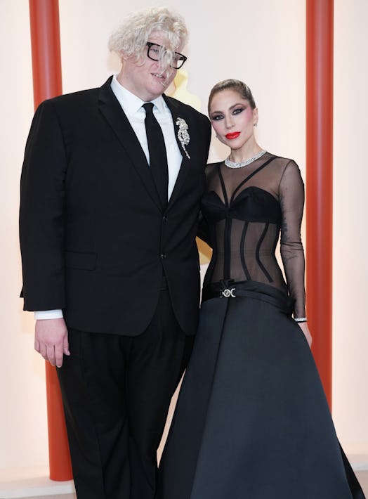 HOLLYWOOD, CALIFORNIA - MARCH 12: (L-R) BloodPop and Lady Gaga attend the 95th Annual Academy Award…