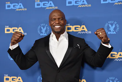 Terry Crews, the daddy for Cancer zodiac signs, strikes a pose during a red carpet