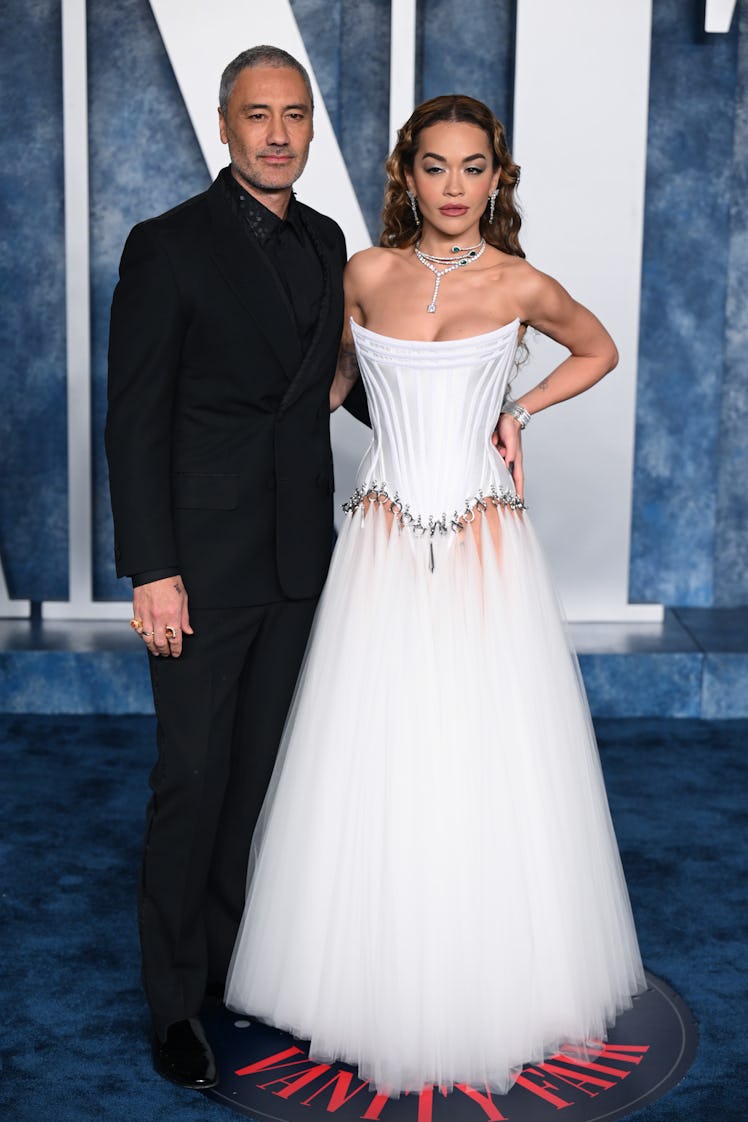 Taika Waititi (L) and Rita Ora attend the 2023 Vanity Fair Oscar Party 