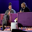 ATLANTA, GEORGIA - DECEMBER 02: Former First Lady Michelle Obama and Tyler Perry speak onstage durin...