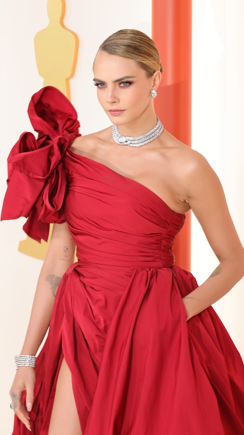 Cara Delevingne attends the 95th Annual Academy Awards