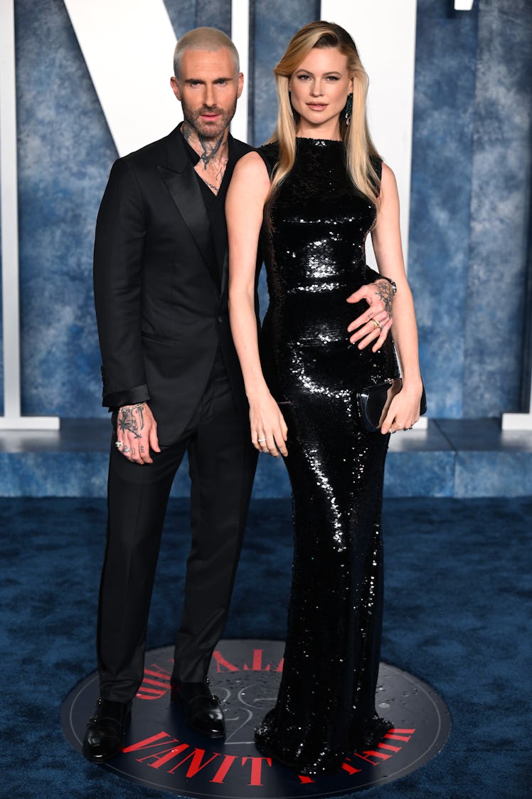 Adam Levine (L) and Behati Prinsloo attend the 2023 Vanity Fair Oscar Party 