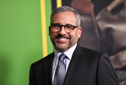 Steve Carell, the daddy for Pisces zodiac signs, smiles on a red carpet