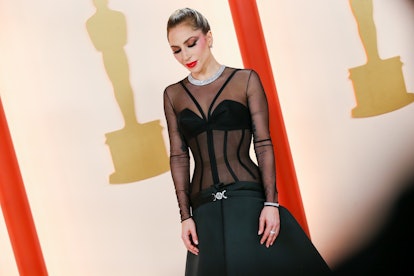 Lady Gaga performed "Hold My Hand" at the 2023 Oscars in no-makeup, jeans, and a T-shirt.