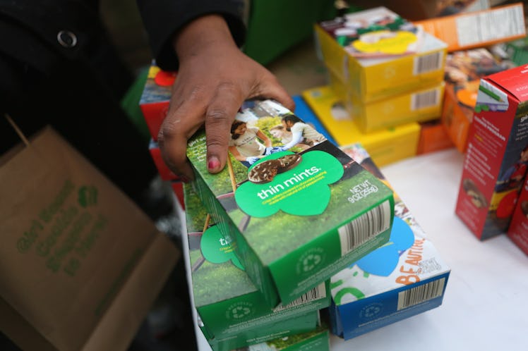 NEW YORK, NY - FEBRUARY 08: Girl Scouts sell cookies as a winter storm moves in on February 8, 2013...
