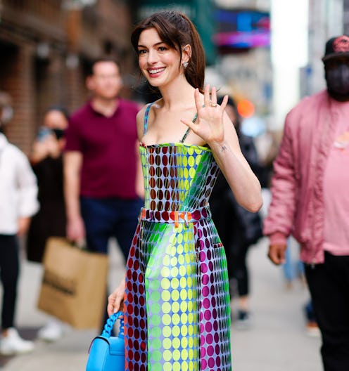Anne Hathaway at Stephen Colbert Show in Versace on March 15, 2022