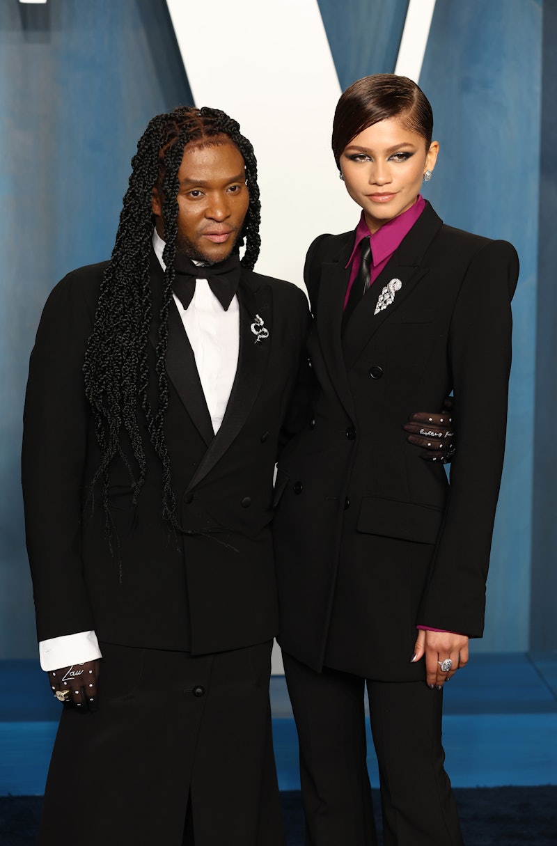 Law Roach and Zendaya attend the 2022 Vanity Fair Oscar Party in matching black suits