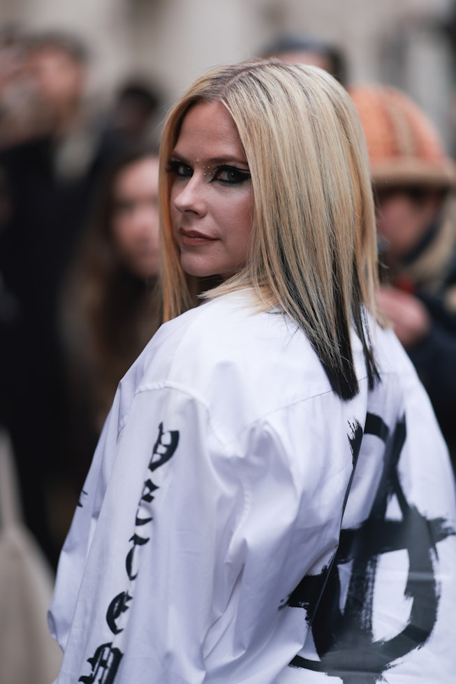 PARIS, FRANCE - MARCH 05: Avril Lavigne seen wearing a black and white jacket before the Ottolinger ...