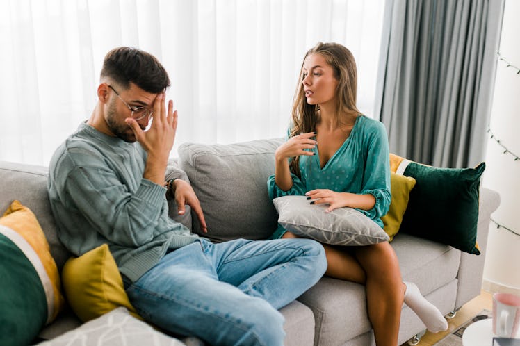 Shot of a young couple having an argument at home