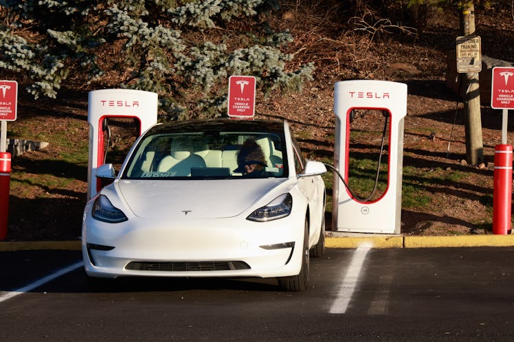 UNION CITY, NEW JERSEY - FEBRUARY 18: A vehicle sits at a Tesla charging station on February 18, 202...