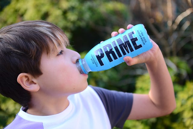 A photo illustration of the photographers son drinking a Prime energy fruit drink on February 5,2023...
