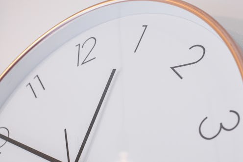 A still life of white clock on the wall"r