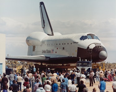 Space Shuttle Challenger (STA-099) during its rollout from the Space Transportation Systems Division...