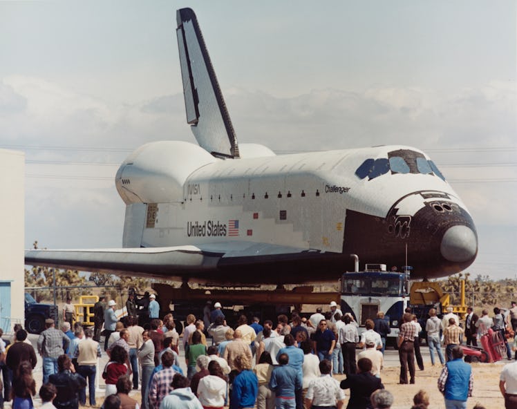 Space Shuttle Challenger (STA-099) during its rollout from the Space Transportation Systems Division...