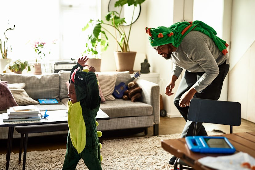 Dad chases son through house, both dressed as dinosaurs, in a list of quotes about having sons.