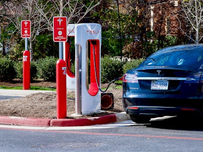 Fairfax, Virginia, USA - November 17, 2022: A Tesla Model S vehicle charges at a Tesla electric vehi...