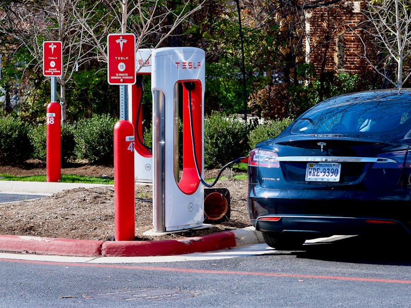 Fairfax, Virginia, USA - November 17, 2022: A Tesla Model S vehicle charges at a Tesla electric vehi...