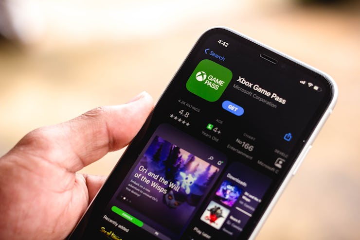 BRAZIL - 2021/03/16: In this photo illustration the Xbox Game Pass logo in App Store seen displayed ...