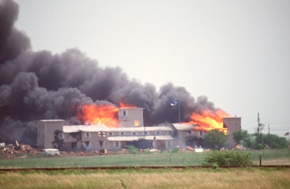 Smoking fire consumes the Branch Davidian Compound during the FBI assault to end the 51-day standoff...