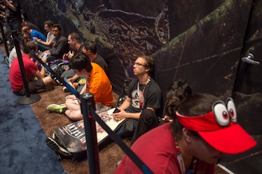 LOS ANGELES, CA - JUNE 13: People wait in line for the Monster Hunter World demonstration at the Pla...