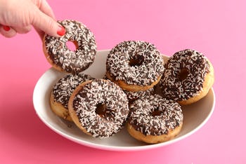 Woman about to eat a doughnut