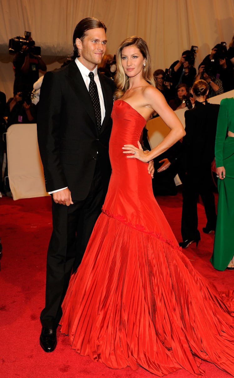 Tom Brady and Gisele Bundchen attends the "Alexander McQueen: Savage Beauty" Costume Institute Gala