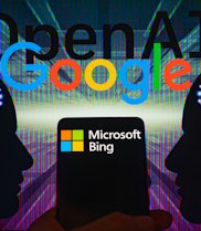 Google - OpenAI  displayed on screen with Microsoft Bing on mobile seen in this photo illustration. ...