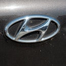 Logo of Hyundai on a car.