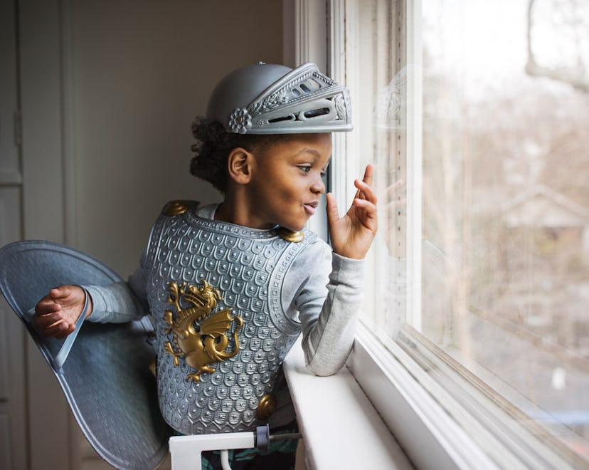 adorable kid in medieval costume in roundup article of arthurian baby names