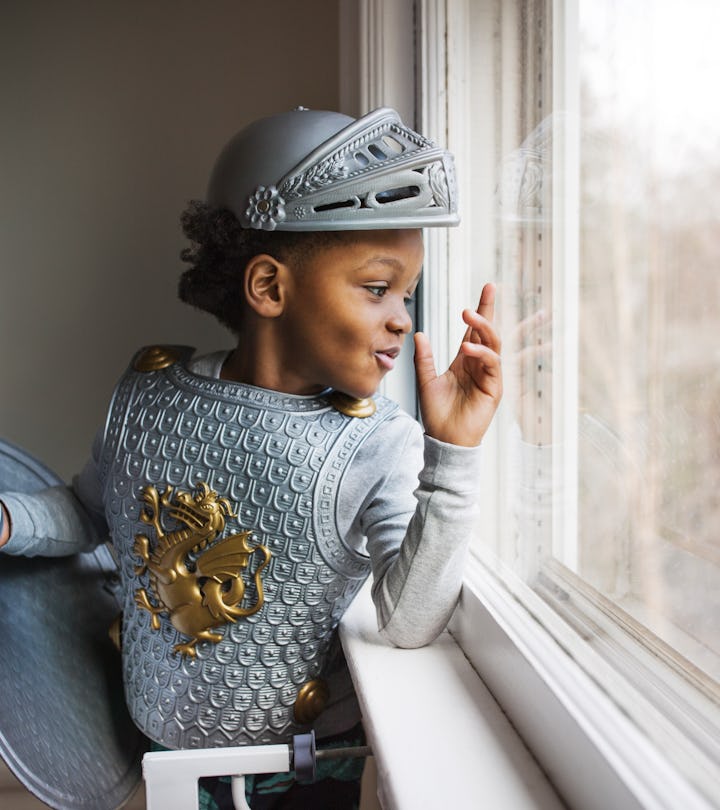 adorable kid in medieval costume in roundup article of arthurian baby names