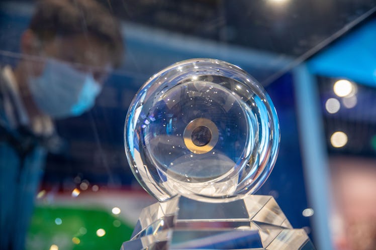 HAIKOU, CHINA - MAY 17: A visitor watches lunar soil brought back by China's Chang'e-5 probe during ...