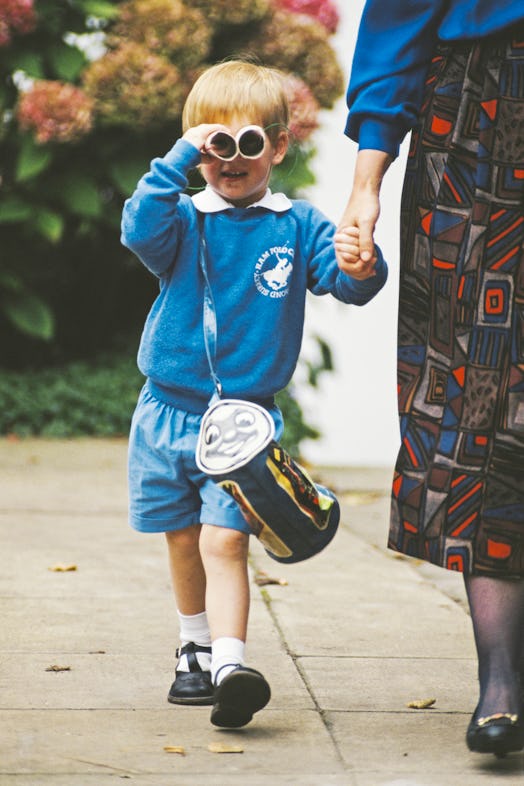 Prince Harry with headmistress Jane Mynors on his first day at nursery school, Notting Hill, London,...