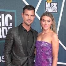 NASHVILLE, TENNESSEE - APRIL 11: Taylor Lautner and Taylor Dome attend the 2022 CMT Music Awards at ...