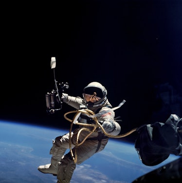 Ed White performs first U.S. spacewalk, 1965. Astronaut Edward H. White II, pilot for the Gemini-Tit...
