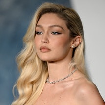 'Next in Fashion' host Gigi Hadid is a fan of layering perfumes, according to makeup artist Erin Par...