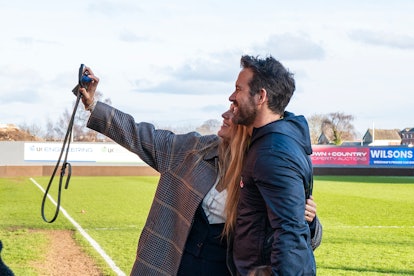 rexham co-owner Ryan Reynolds has his picture taken by his wife Blake Lively prior to the Vanarama N...